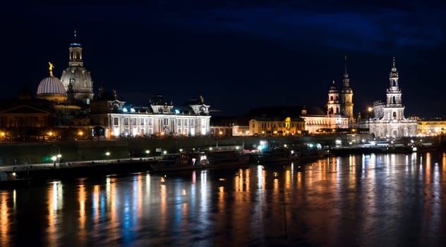 The historic city of Dresden along the river Elbe in the night