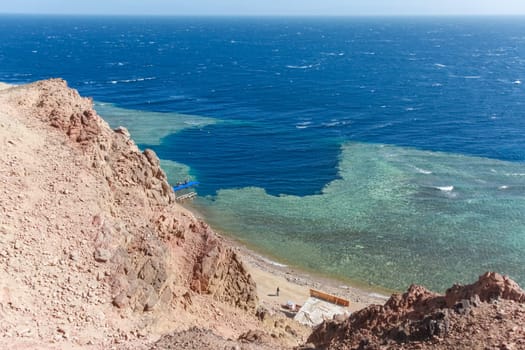 Blue Hole is a popular diving location on east Sinai, a few kilometres north of Dahab, Egypt on the coast of the Red Sea.