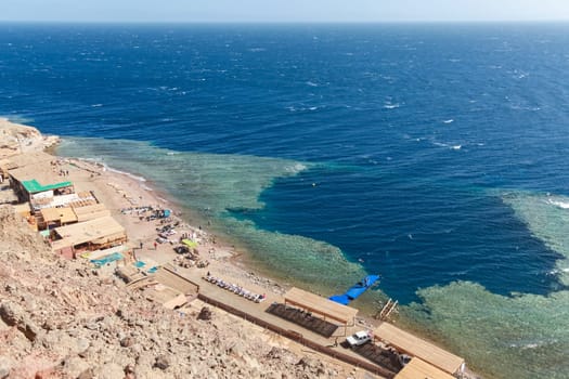 Blue Hole is a popular diving location on east Sinai, a few kilometres north of Dahab, Egypt on the coast of the Red Sea.