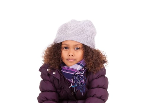 Little african asian girl wearing winter clothes,isolated on white background