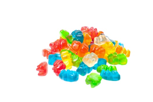 A stack of colorful gummy bears isolated over white