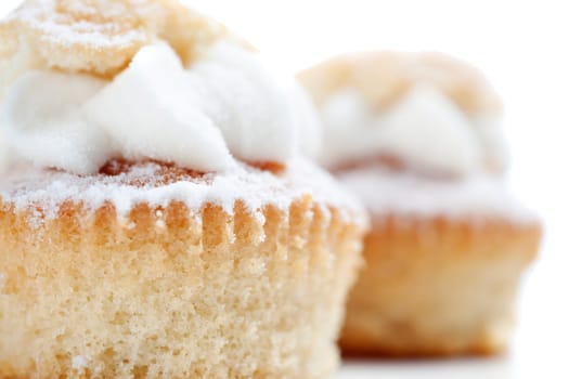 Freshly baked cup cakes with cream filling