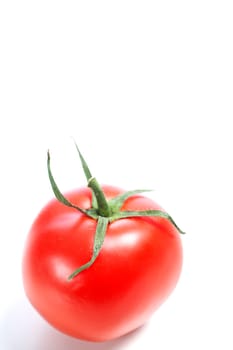 Fresh ripe tomato on isolated background