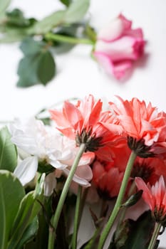 Flower cuttings being prepared to be arranged to make a bouquet.