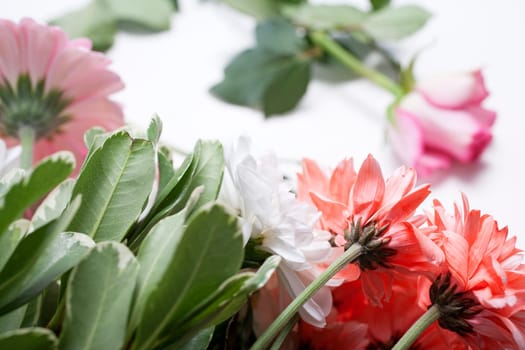 Flower cuttings being prepared to be arranged to make a bouquet.
