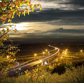 Highway in night with cars light in modern city in Taiwan, Asia.