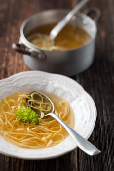 Beef stock with noodles close up shoot