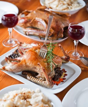 Roasted duck for holidays on the table close up