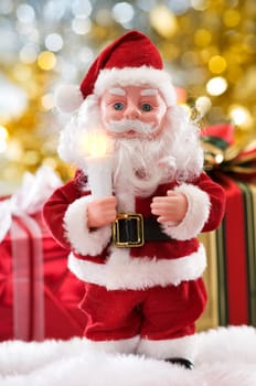 santa toy standing in front of presents
