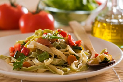 Fresh pasta salad with tomato and roasted vegetables