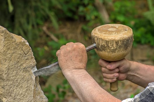 Sculptor working on a sculpture
