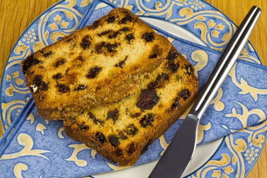 A couple of slices of rich fruity loaf cake