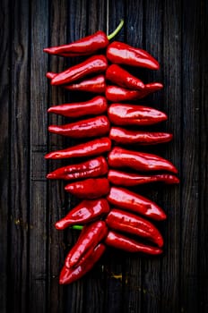 Espelette peppers hanging at a door