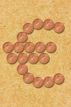 Euro currency sign shaped with cent coins