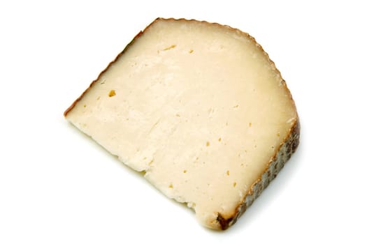 a piece of goat cheese isolated on white