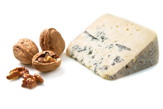 blue cheese with walnut on white background