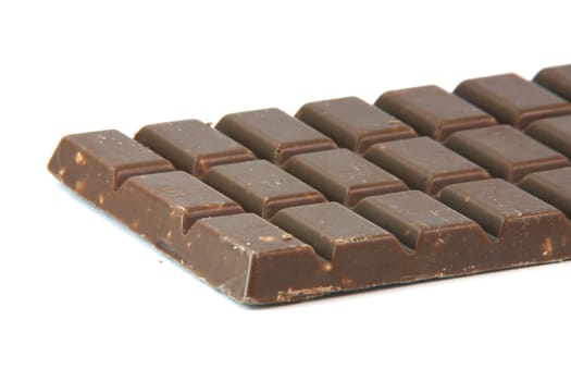 chocolate bar detail with copy space isolated on white background food and sweets concepts