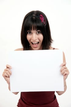 Woman holds a blank white card