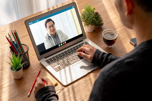 Doctor video call online by modish telemedicine software application for virtual meeting with patient