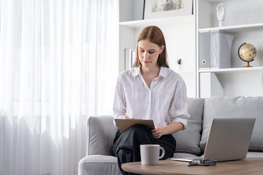 Psychologist woman in clinic office professional portrait with friendly smile feeling inviting for patient to visit the psychologist. The experienced and confident psychologist is utmost specialist