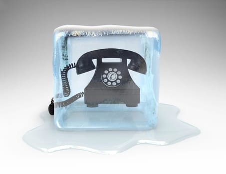Telephone frozen in a block of ice