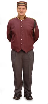 Bellhop standing with his hands behind his back, smiling at the camera, on a white background.