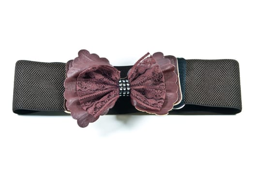 Brown fabric belt and black line is elastic on white background.