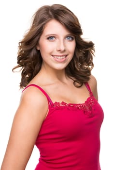 Young and smiling girl against white background