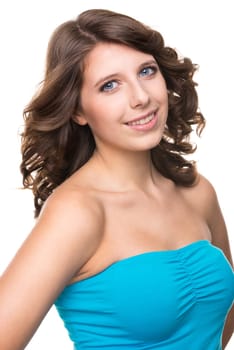 Young and smiling girl against white background