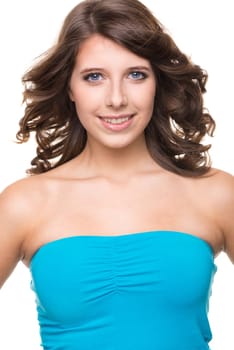 Young and smiling girl against white background