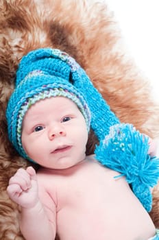 Shot of newborn baby lying on fur