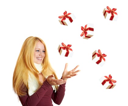 beautiful blonde woman catching falling christmas gifts
