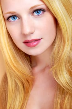 portrait of a beautiful blonde girl with strong and healthy hair