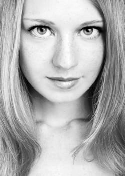 portrait of a beautiful blonde girl with strong and healthy hair