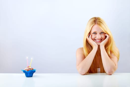 beautiful blonde woman clebrating her birthday