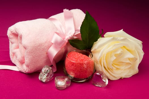 scented products for body care on colored background