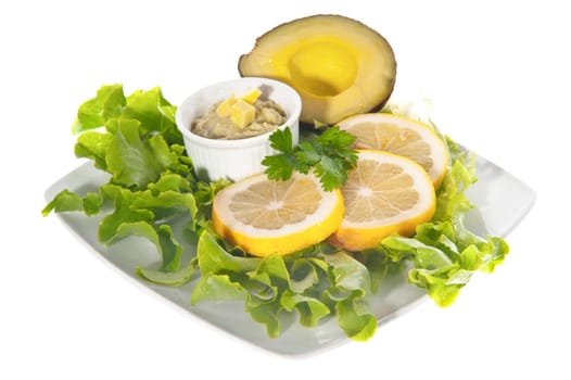 avocado salad with lemon on white background