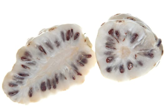 morinda citrifolia fruit on a white background