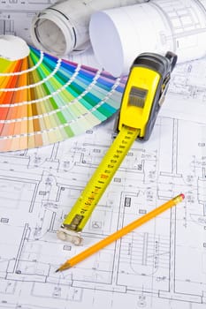 Architectural drawing, blueprint, pencil and measurement tape