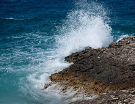 waves breaking on the shore