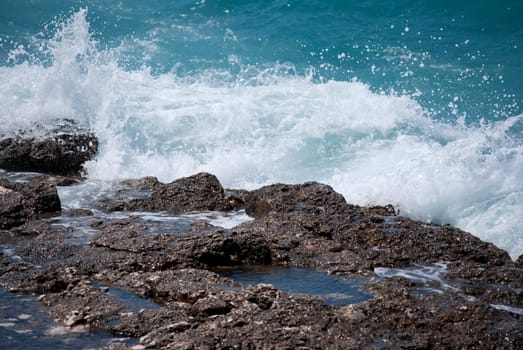 waves breaking on the shore
