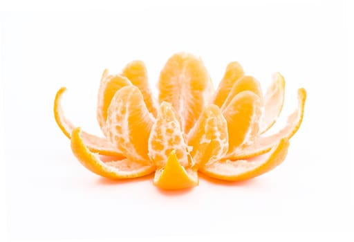 Peeled fresh delicious tangerine isolated on white