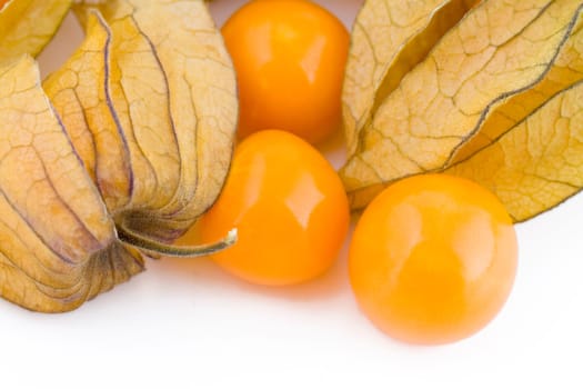 Fresh small physalis isolated on white background, jam-berry fruits