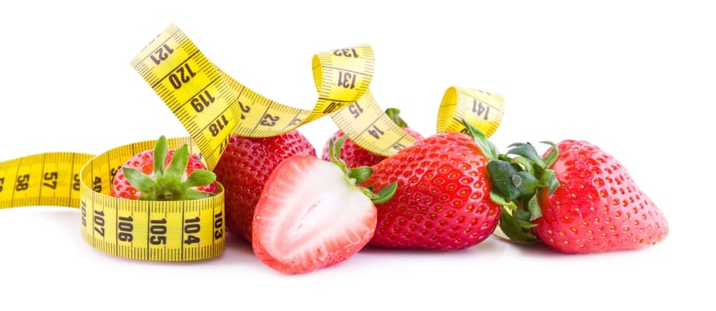 Fresh strawberries with measure tape isolated on white