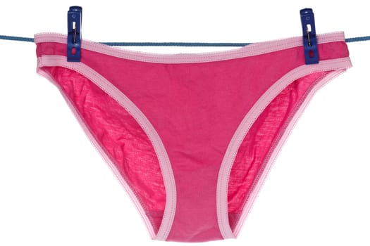 red panties hung on the clothes line. isolated on white background
