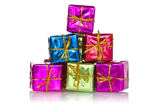 Pyramid made from color gift boxes. Isolated on white background