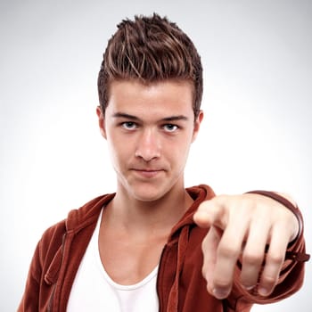Young handsome man in red blouse pointed you
