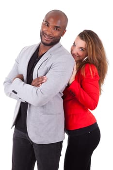 Portrait of a young happy mixed couple, isolated on white background
