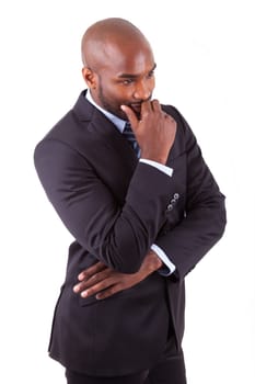 Portrait of a young African American business man thinking, isolated on white background