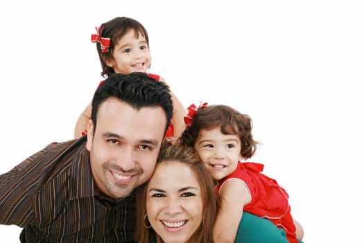 Beautiful family enjoying, mom and dad playing with their daughter